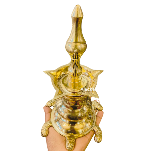 BRASS DIVINE VASTHU VILAKKU WITH 5 WICKS AND TORTOISE BASE