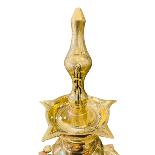 BRASS DIVINE VASTHU VILAKKU WITH 5 WICKS AND TORTOISE BASE