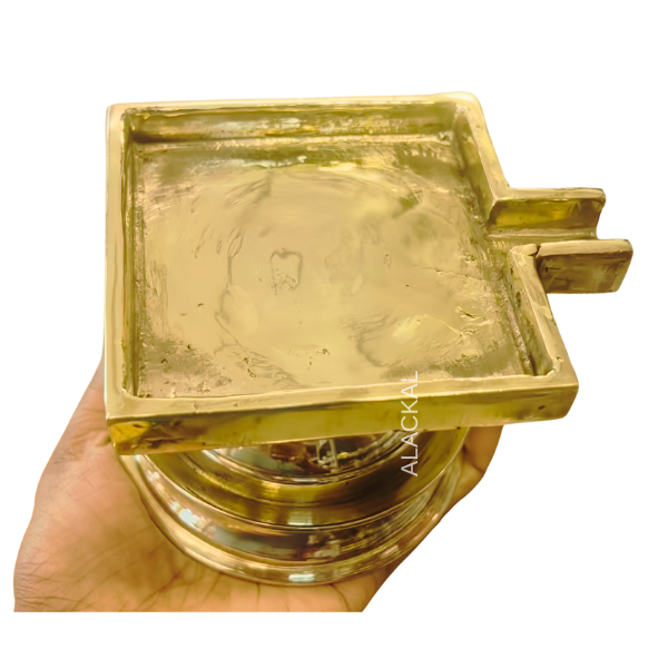 Handmade bronze square abhisheka stand for Hindu pooja rituals, abhishekam ceremonies, temple use, spiritual offerings, durable traditional pooja stand crafted by skilled artisans at Alackal Bell Metals Mannar