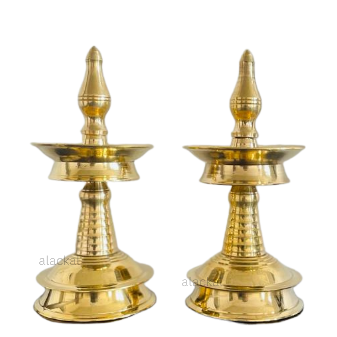 Elegant brass nilavilakku lamp set for pooja and home decoration