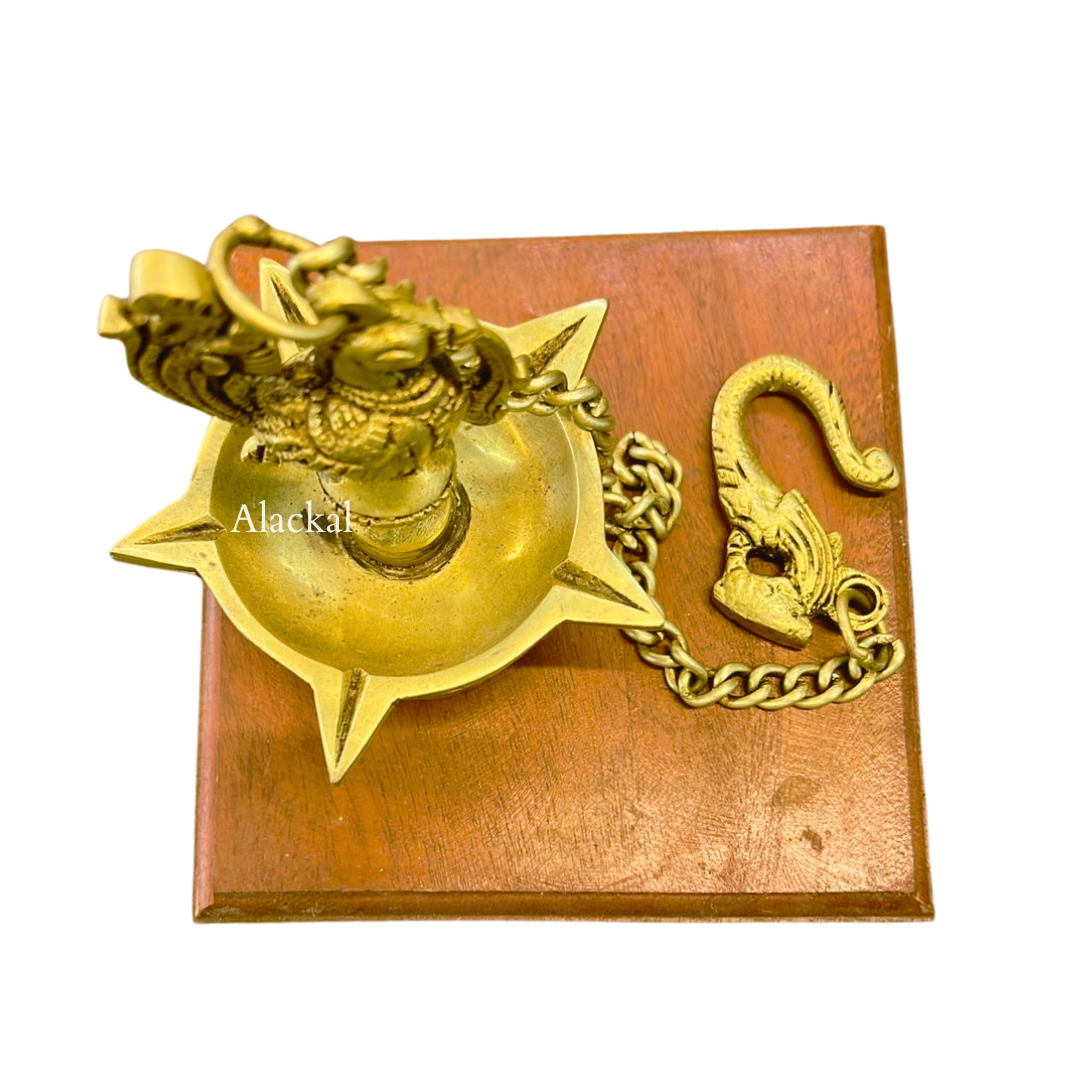 Traditional brass peacock-headed diya hanging lamp for home temple and festive celebrations